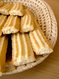 You can present small cookies and hors d'oeuvres charmingly on tiered serving trays.