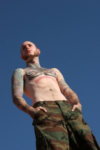 Fill up the empty space on your waistline with a tattoo.