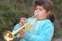 Acquire a grant for a student to get a musical instrument.