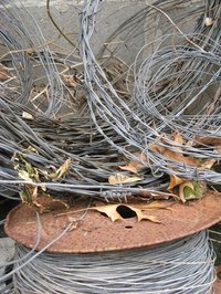 Solder steel wire the same way you solder silver wire.