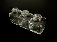 You can cover bottles with colorful wax.
