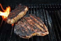 A meat thermometer definitely answers the question of whether the steak is done.