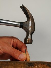 A handyman assists homeowners with a variety of small jobs around the house.