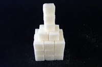 Make sugar cubes stick together with glue or icing.