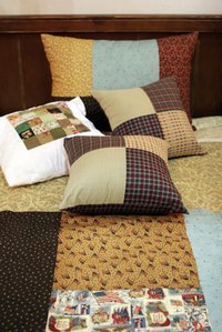 Make a blanket to preserve memorable souvenir sweaters.