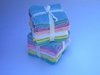 Washcloths also can be folded simply and tied with a ribbon.