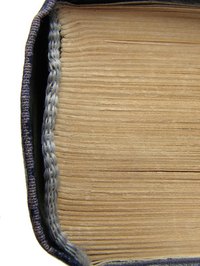 You can remove the adhesive from your book's binding.