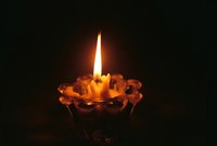 When making soy candles, reduce "frosting" by carefully controlling tempatures.