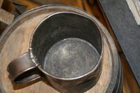 Tin cups are often made of tin-plated steel.