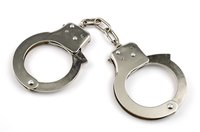 Handcuffs can be used to restrain a persons' wrists or ankles.