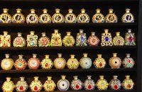 You can distribute perfume oil through domestic mail if it meets certain requirements.