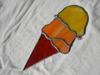 Create faux stained glass on acrylic sheets with glass paint and liquid lead.