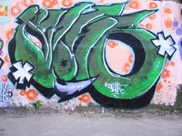 Graffiti artists use an airbrush to paint their designs.
