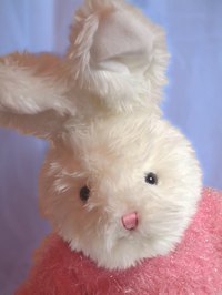 Create a cute bunny pinata using paper mache.