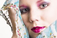 Head scarves add a pop of color and pattern to an outfit.