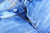 Attach snap buttons to denim.