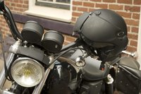 Customizing a helmet with flat black paint can be done at home.
