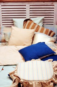 One large pillow may be more comfortable than several small ones.