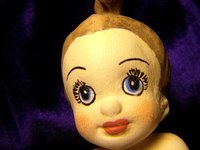 Doll faces can be simple or complex.