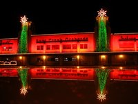 Christmas lights hung in a straight line can enhance a structure's exterior.