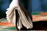 Ironing a paper napkin onto freezer paper allows crafters to express themselves.