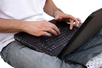 Make your monitor stand large enough to fit across your lap and avoid this cramped work position.