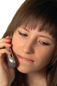 Poor posture while talking on the phone can contribute to neck pain.