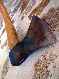 When sharpening an axe, first make sure the head is firmly attached to the handle.