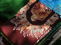 A smooth application of fabric glue eliminates bumps and wrinkles on the final project.