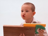 Children love working with real carpentry tools.