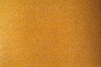 Sandpaper will help to even the surface before you polish.