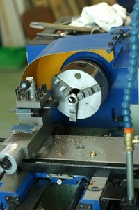 Cutting oil is used when machining parts on devices such as lathes.