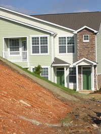 Prepare yourself for a challenging task when you decide to build a home on a steeply sloped site.