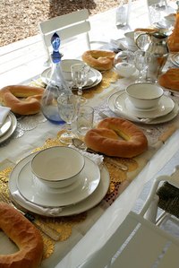 Affordable vases and placemats can make your party table stand out.