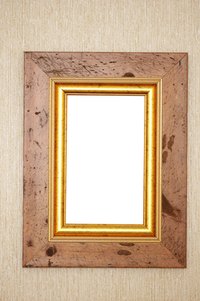 Lightweight pictures may be suspended with non-marring adhesive fasteners.
