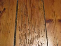 Gaps in a wood floor are usually moisture-related.
