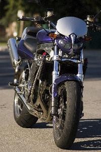 Your used beer cans can see new life as a motorcycle model art piece.
