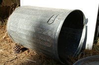 Metal trash cans make simple raku kilns.