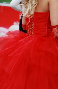 Add some extra femininity to your corset with fabric loops.