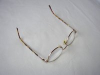 A broken glasses lens can be fixed.