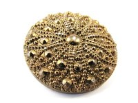 Antique buttons can be sold online and in secondhand stores.