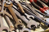 Score the rust off old tools with a wire wheel brush.