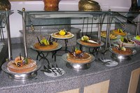Sneeze guards are required on most buffet lines.