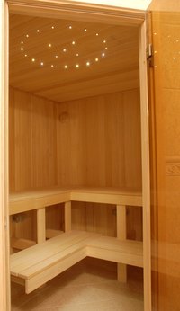 Clean sauna wood with mild detergent and water.