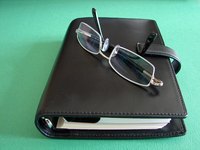 Planning is theoretical, while scheduling is actionable.