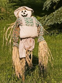 Creating a personalized scarecrow can be a family project.