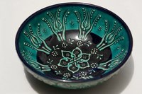 Chinese cloisonné is known for its beautiful designs and bright colors.