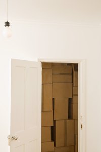 Use old cardboard boxes to creat a Danbo suit.