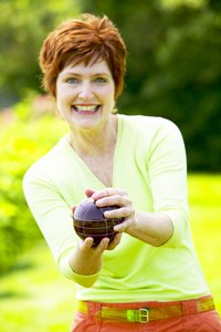 Crochet a carrier for a lawn bowl from 4-ply yarn.