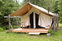 A camping platform gets you up off the ground and on a level surface.